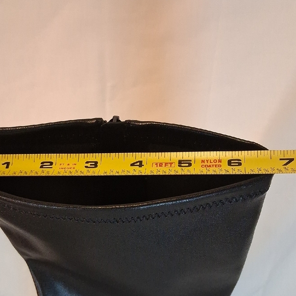 Elegant Black Heeled Boots - Picture 15 of 16